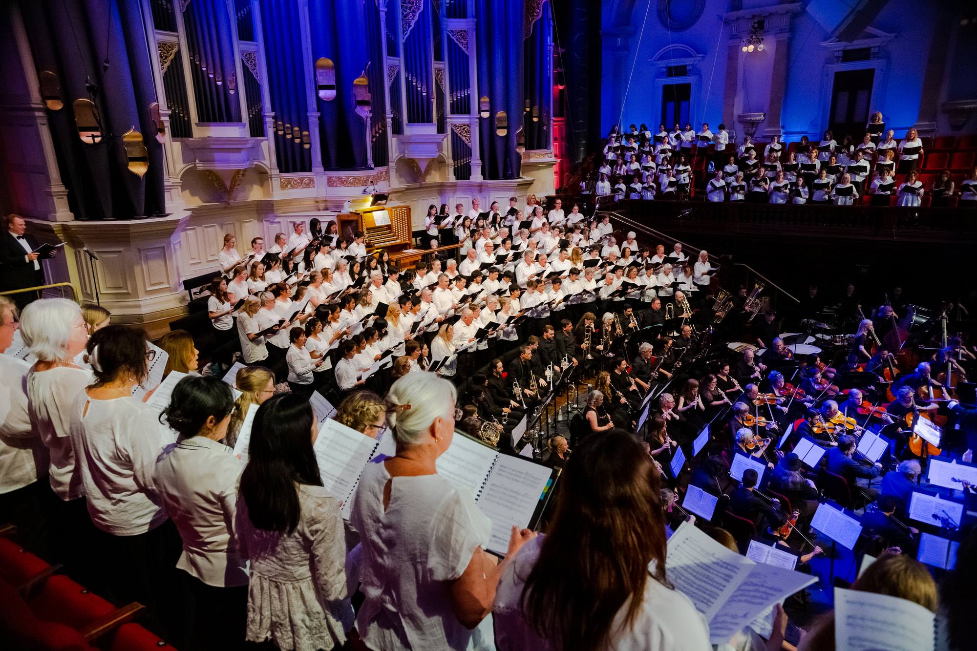 The massed choir and orchestra beneath the Grand Pipe Organ at Sydney Town Hall